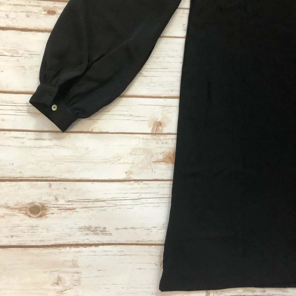 Reyna Couture black blousant sleeve dress